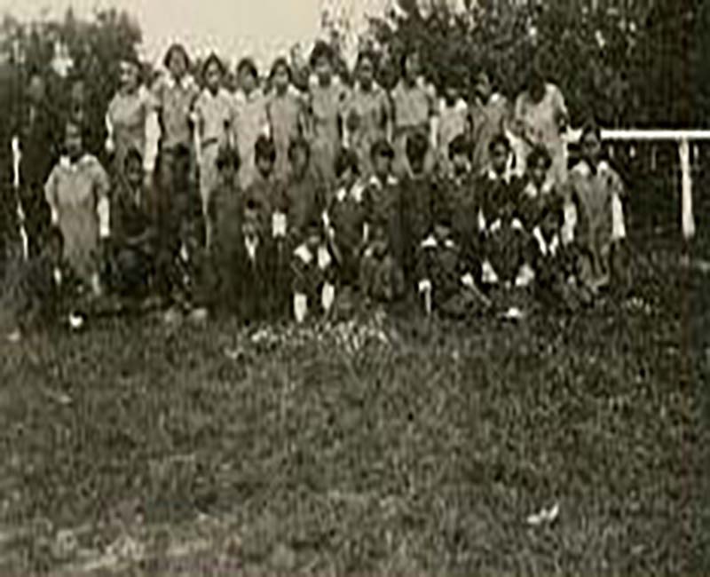 Group of people outside of Fire Hills school 