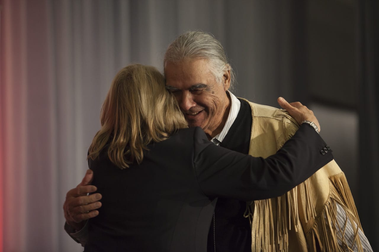 People hugging at TRC closing ceremony