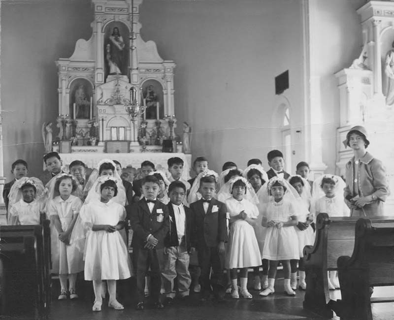 group of students standing in church from Sechelt St. Augustines School
