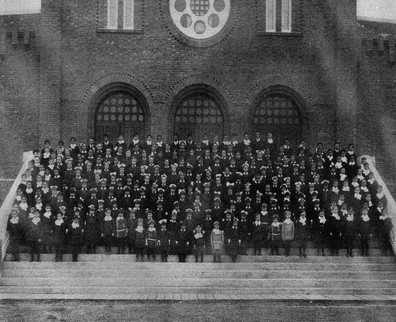 Students in front of St. Albert Youville school building