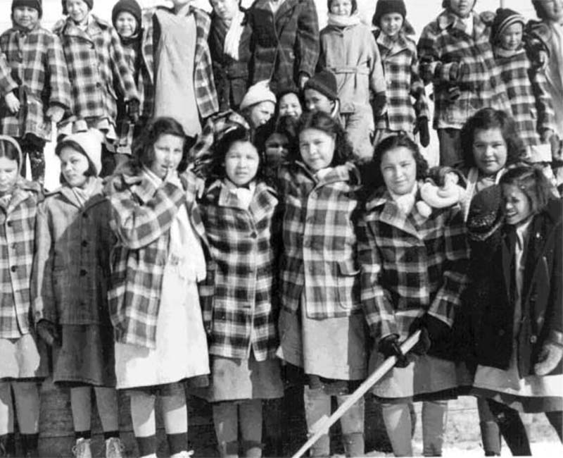 group of students outside Fort Alexander Pine Falls school