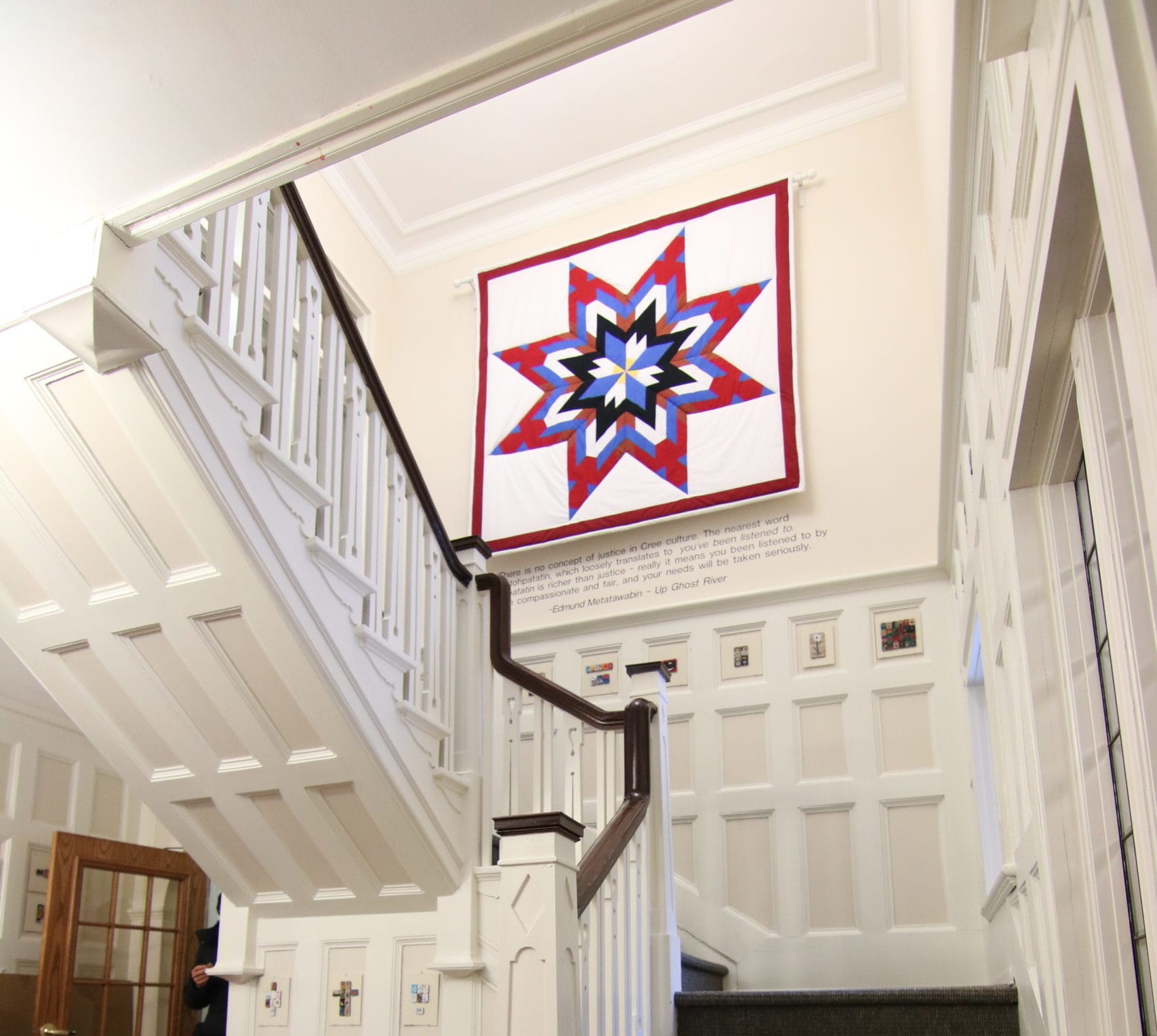 Star blanket hanging in staircase at NCTR building