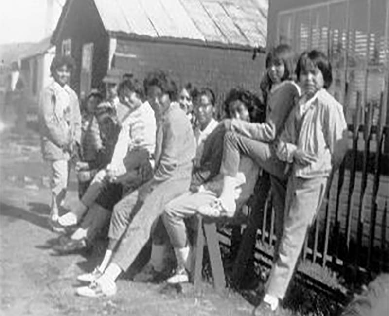 Group of students outside Yukon Hall Whitehorse school