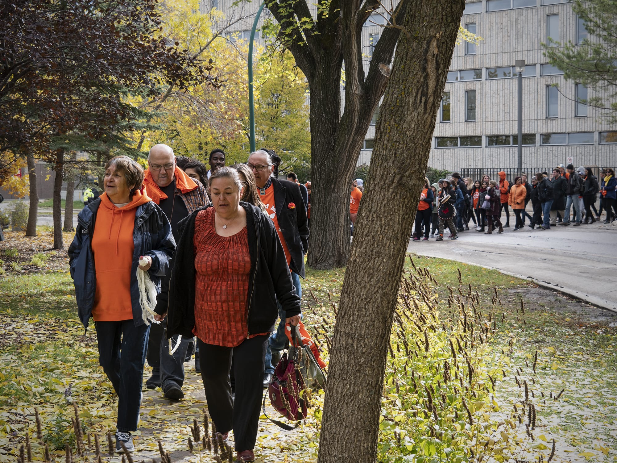 People participating in Orange Shirt Day nurses walk
